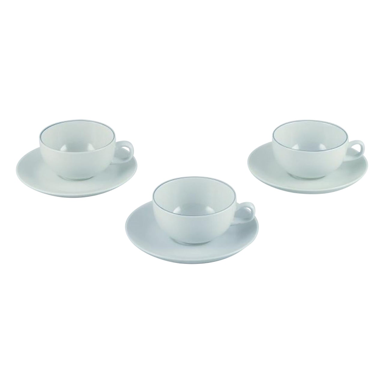 Three Aluminia/Royal Copenhagen blue line coffee cups and saucers. For Sale