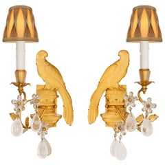 True Pair Of French 20th c. Louis XVI St. Rock Crystal And Gilt Metal Sconces