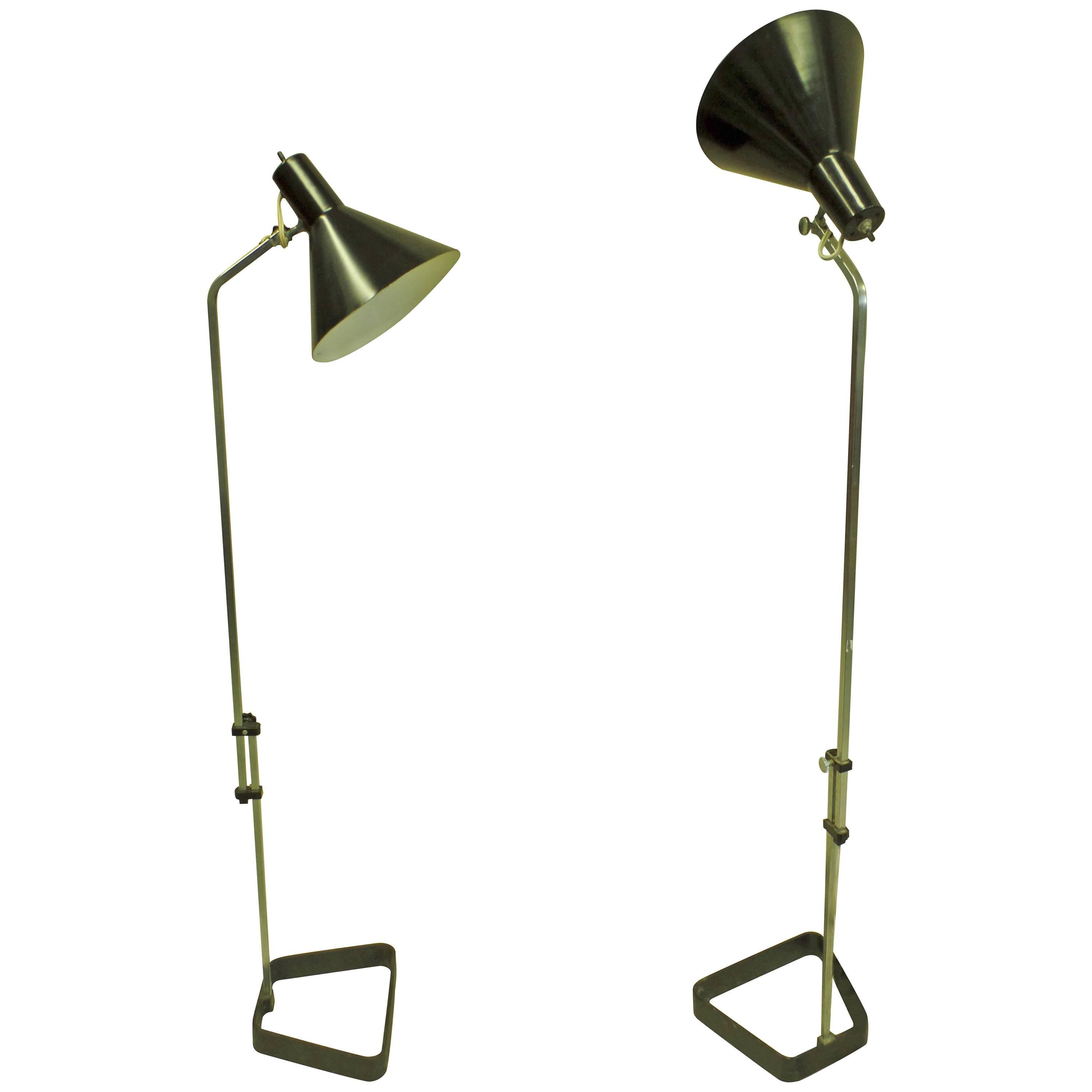 Pair of midcentury Scandinavian Modern standing lamps that adjust upward to 61