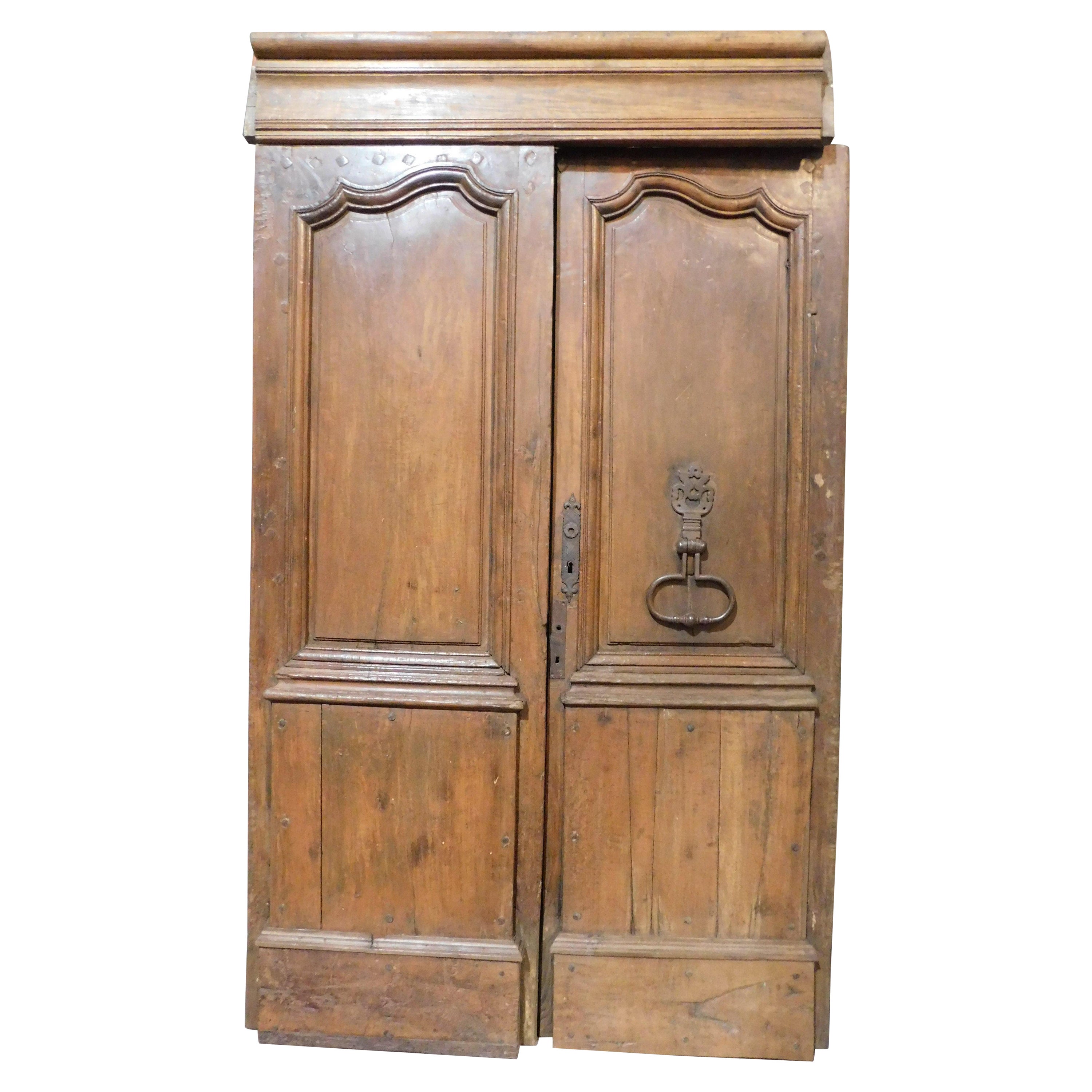 Double wing entrance main old door, carved in walnut wood with beam, Italy For Sale