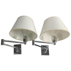 Vintage Pair of Mid Century Modern Chrome Swing Arm Wall Sconces By Hansen Lighting Co.