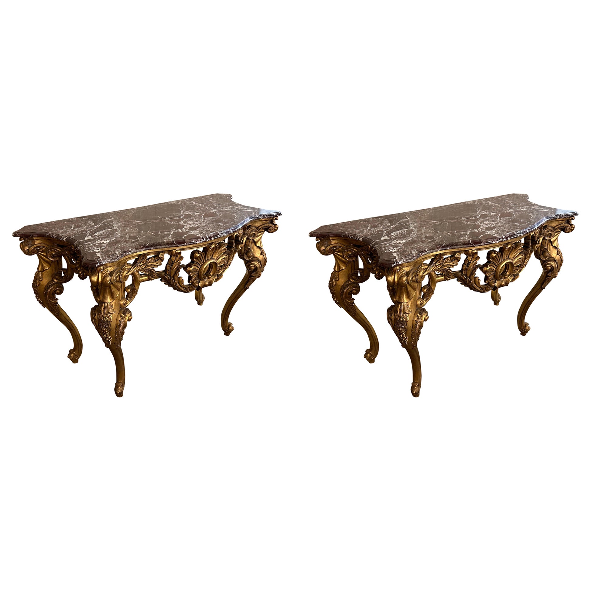 Matching pair, of French Louis XV gilt wood marble top console tables  For Sale