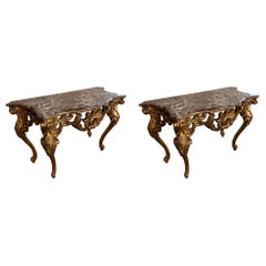 Antique Matching pair, of French Louis XV gilt wood marble top console tables 