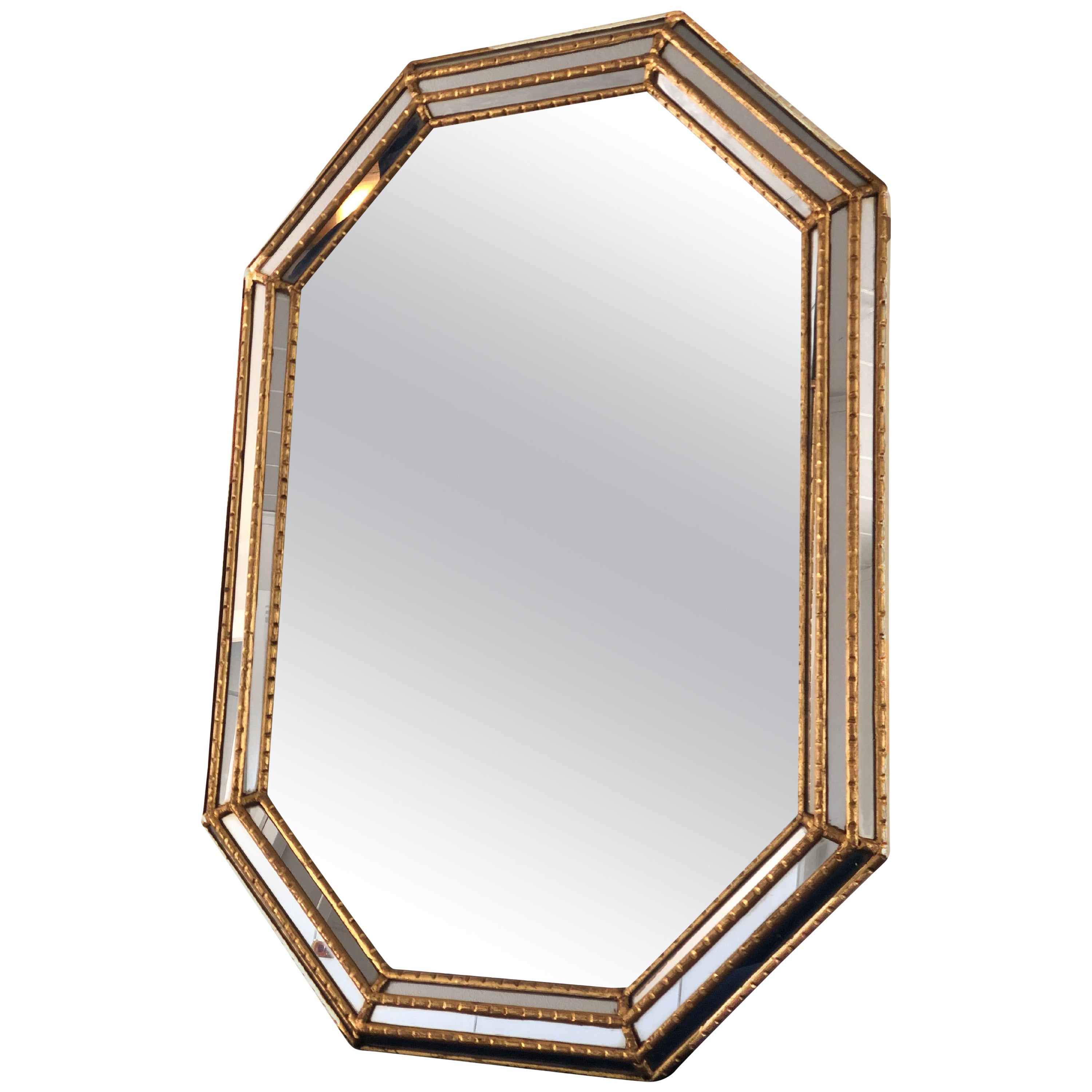 Beautiful Italian LaBarge mirror with a faux bamboo wooden frame in gold. The hand-carved octagonal frame has extra mirrors along the entire length and width.

Handmade mirror In good condition. Italy, 1970

Object: Mirror
Designer: LaBarge
Style: