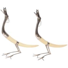 Pair of Hollywood-Regency Silver Plated Stylized Cranes with Fish and Resin Tusk