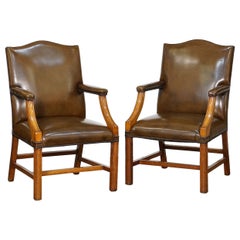 English Armchairs of Upholstered Leather and Mahogany "Priced Individually"