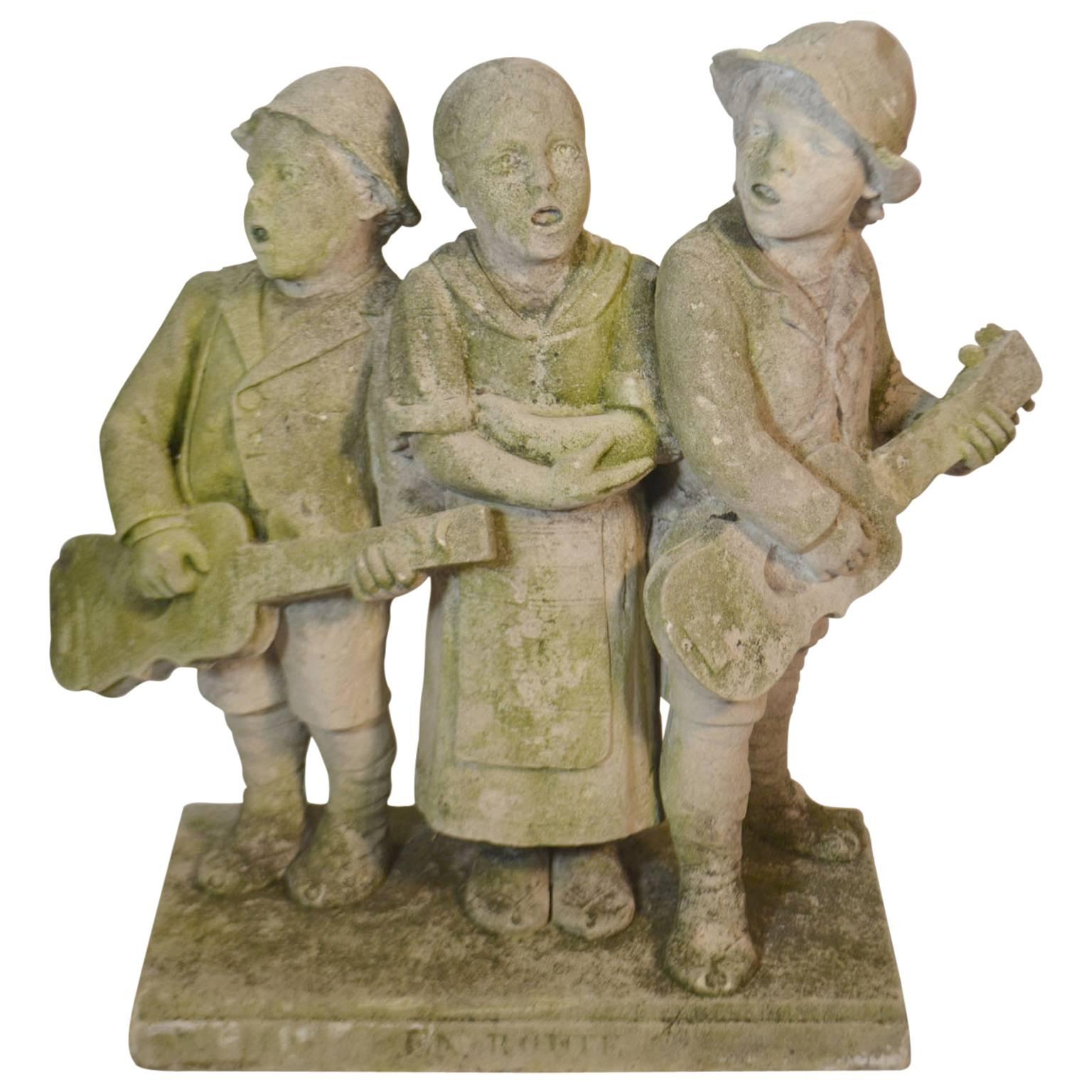 Carved Stone Statue of Children Standing and Singing For Sale