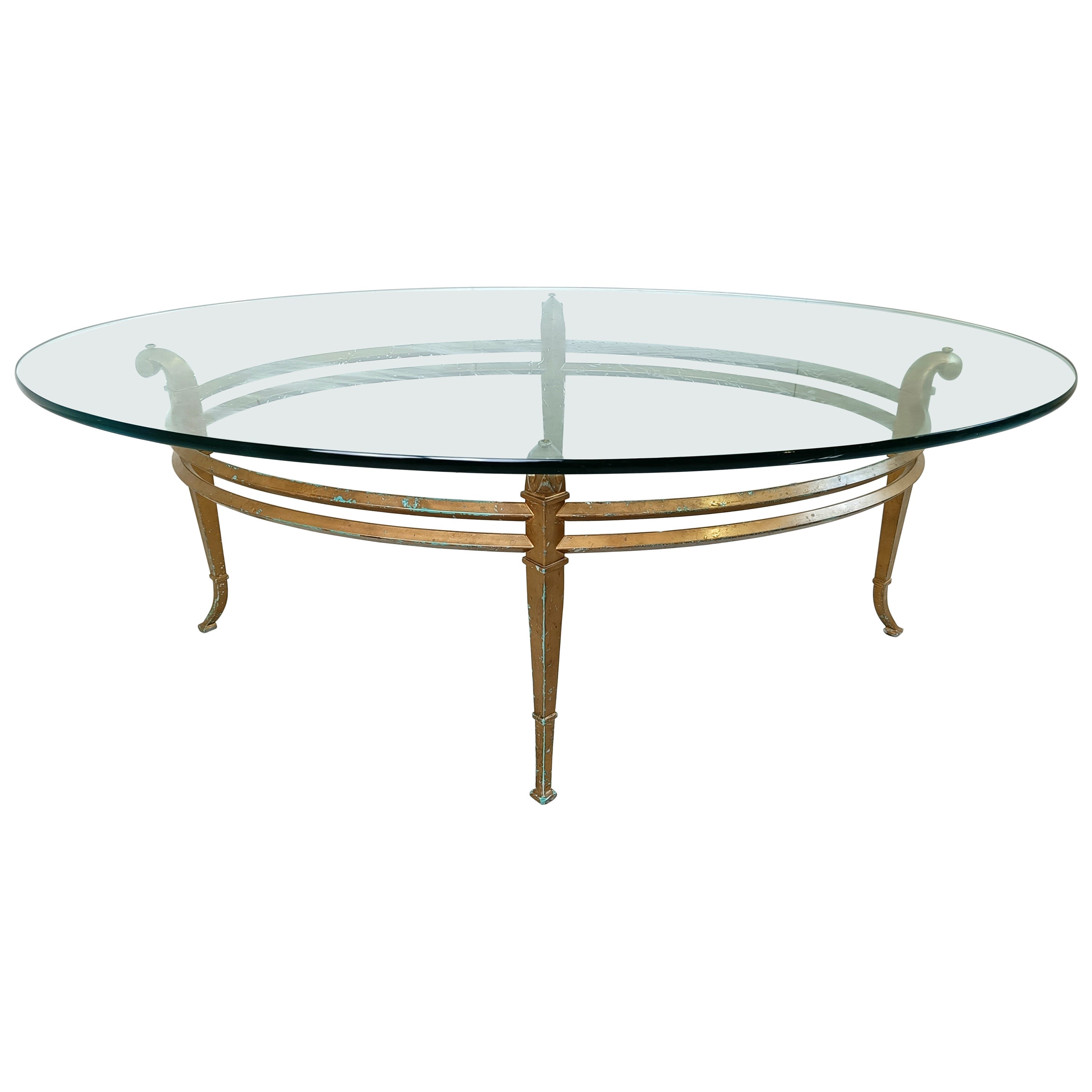 Vintage golden metal and oval glass coffee table, 1970s For Sale