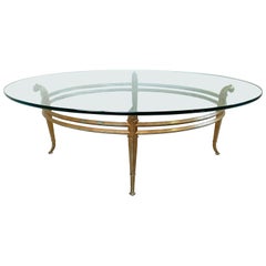 Vintage golden metal and oval glass coffee table, 1970s