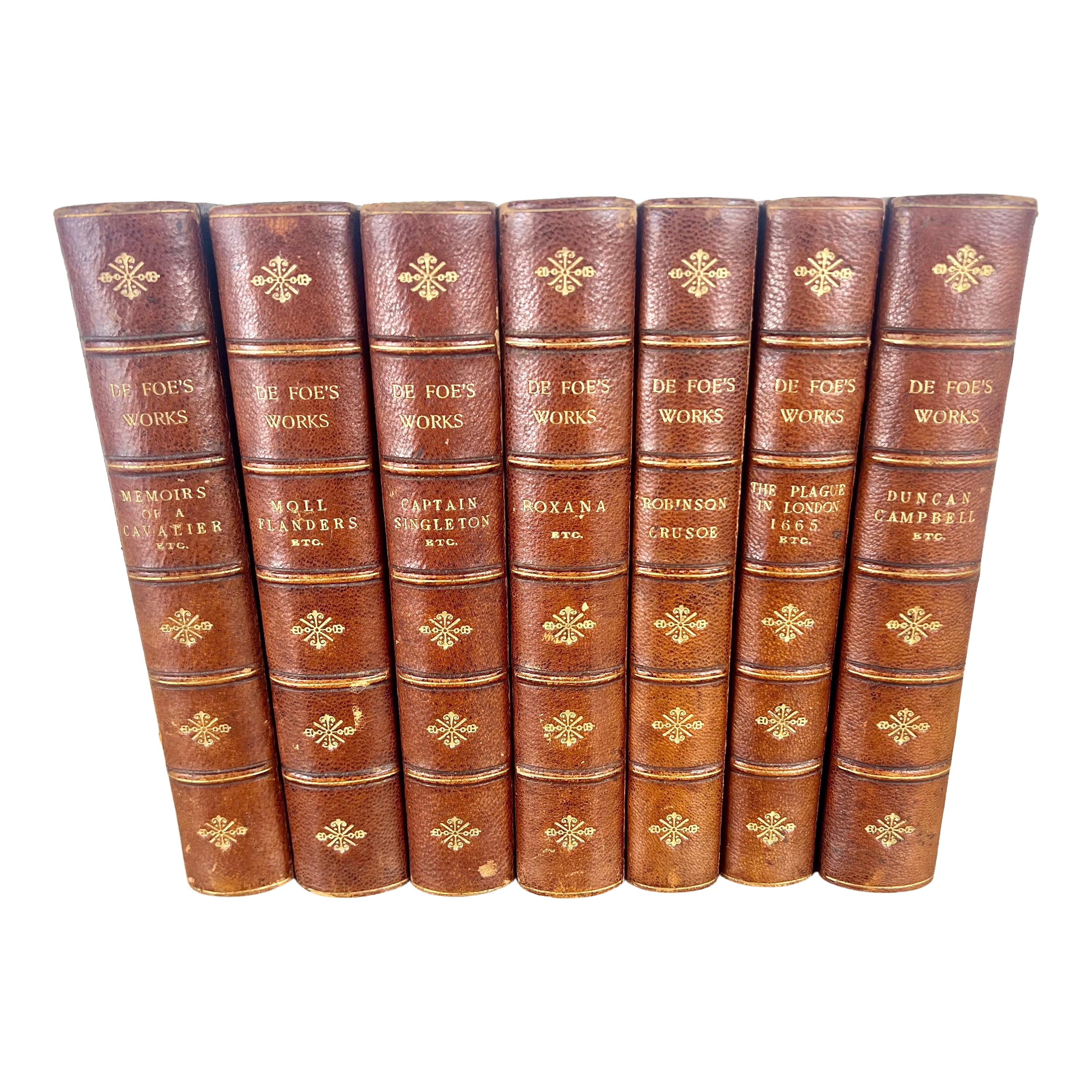 Set of Seven Leather Volumes of Daniel De Foe's Works