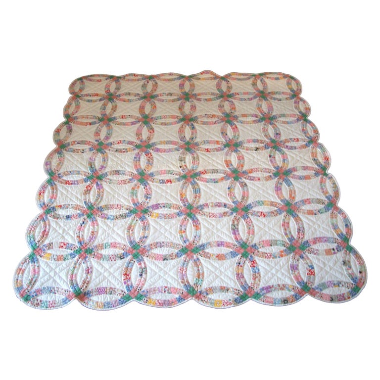 20th C. Pennsylvania Double Wedding Ring Quilt/Pastel Colors at 1stDibs