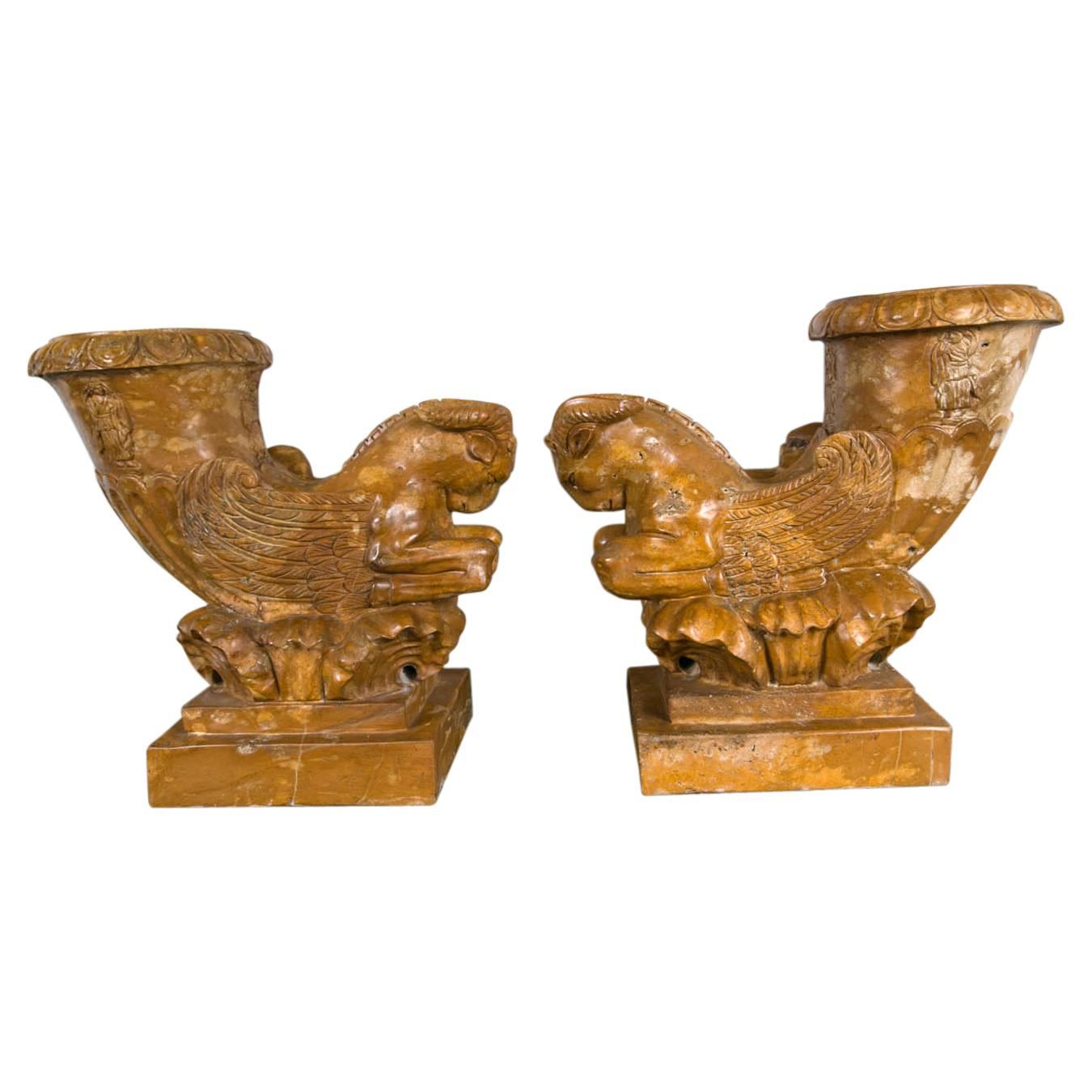 Pair of Solid Marble Rhyton Forms with Winged Rams For Sale