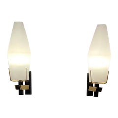 Pair of sconces by stilnovo