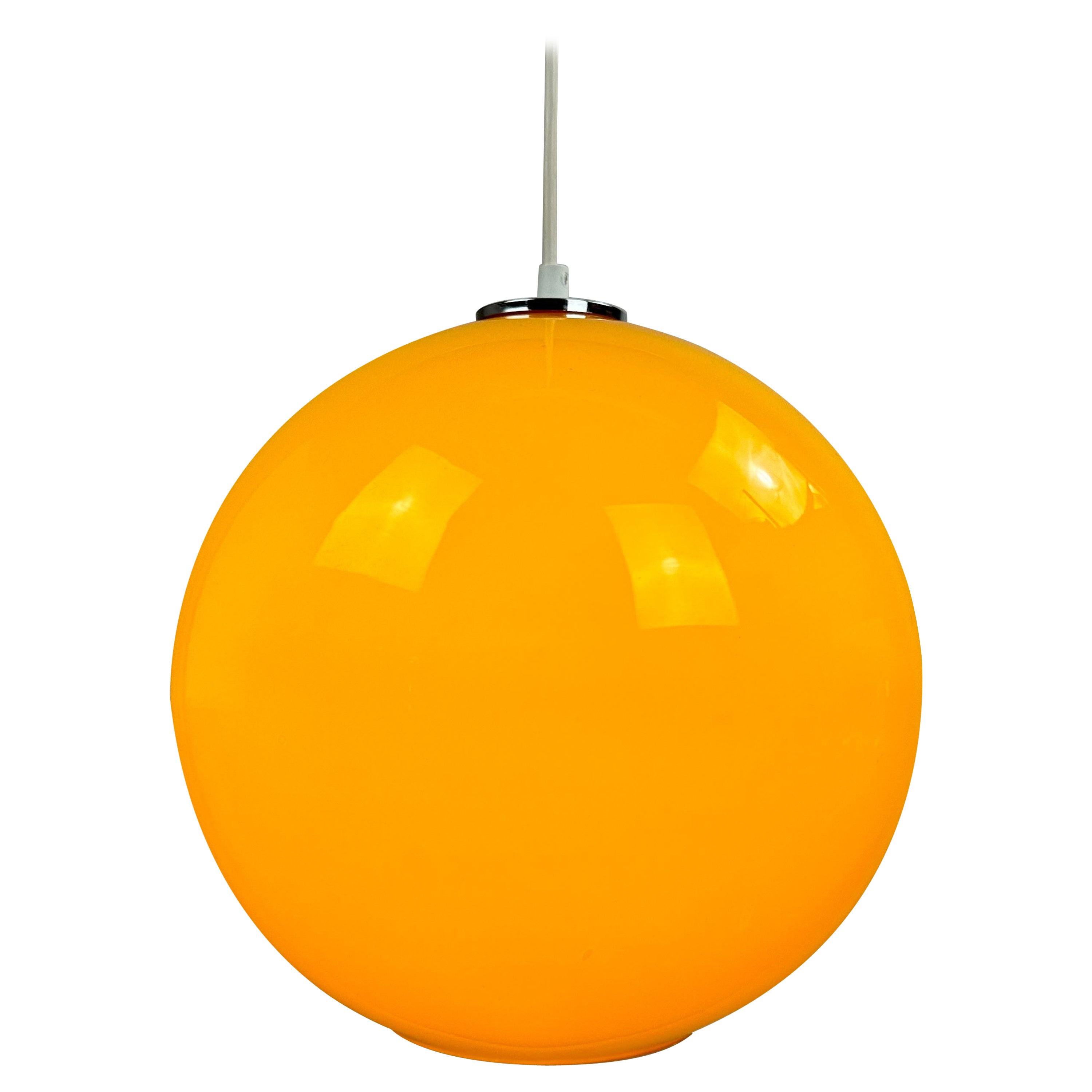 Yellow glass globe pendant light XL by Peill and Putzler 1960 For Sale
