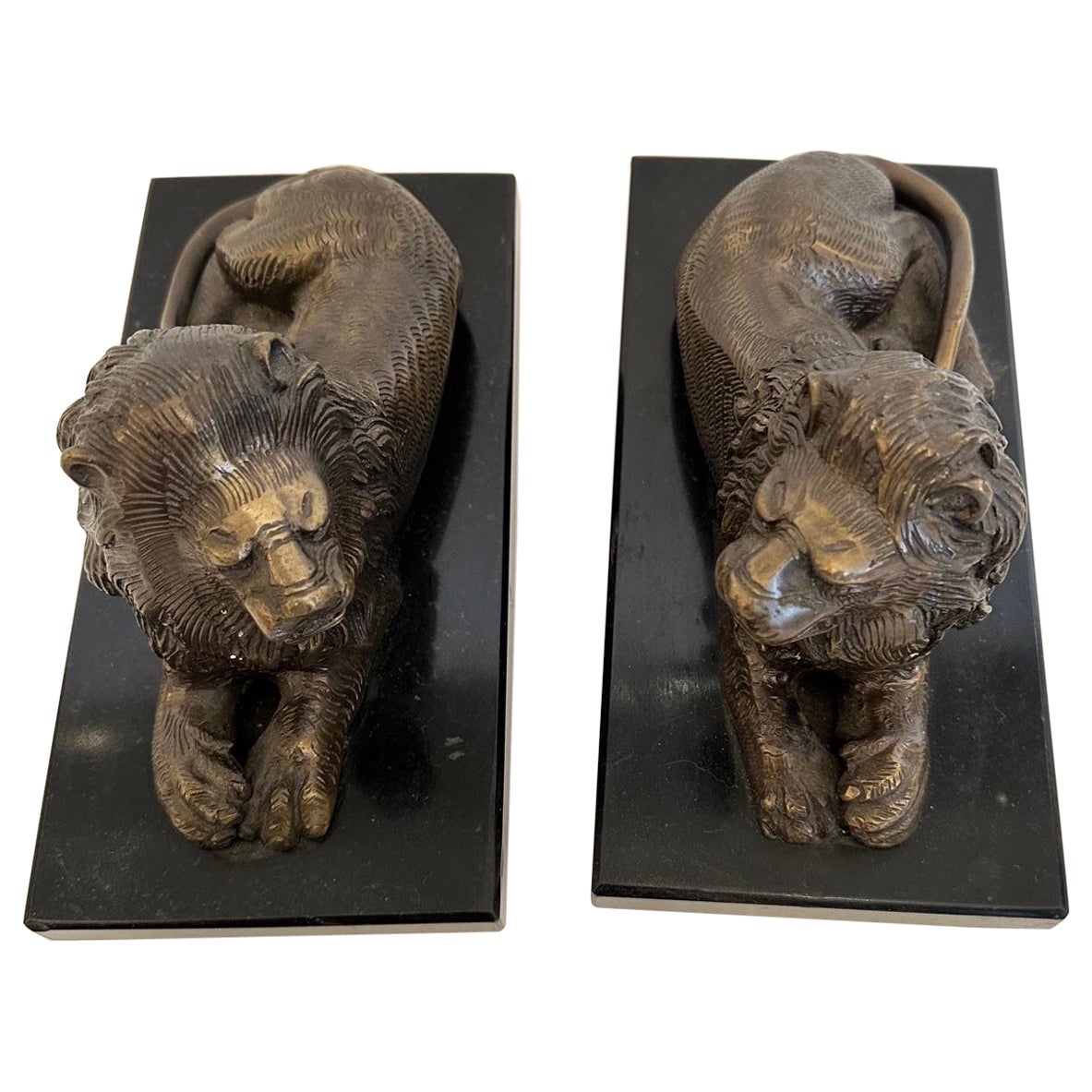 Pair of Bookends Having Recumbent Bronze Lions on Belgian Slate Bases For Sale