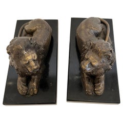 Used Pair of Bookends Having Recumbent Bronze Lions on Belgian Slate Bases