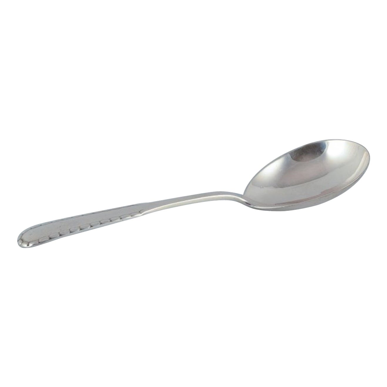 Georg Jensen "Rope" serving spoon in sterling silver.  For Sale