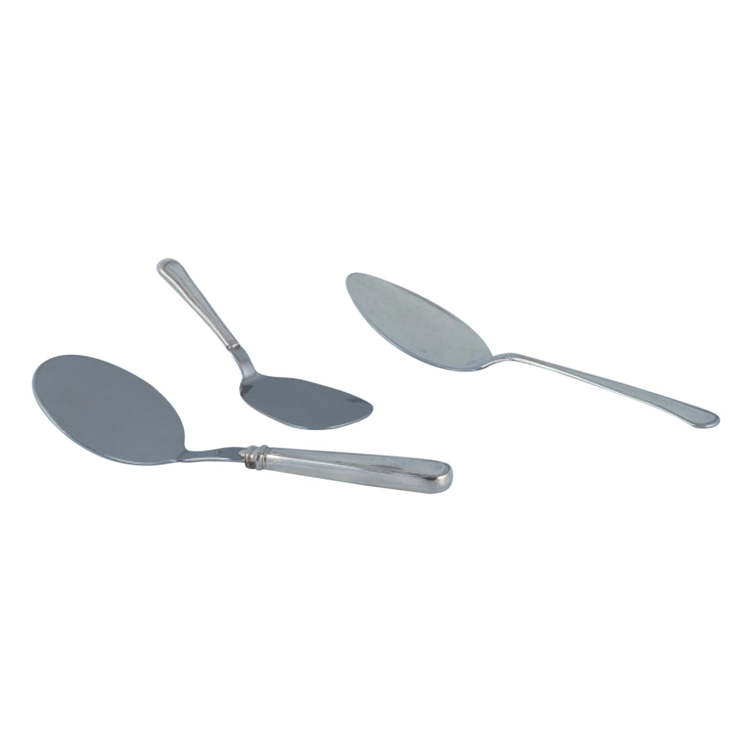 Cohr and other Danish silversmiths. Three "Old Danish" serving ladles For Sale