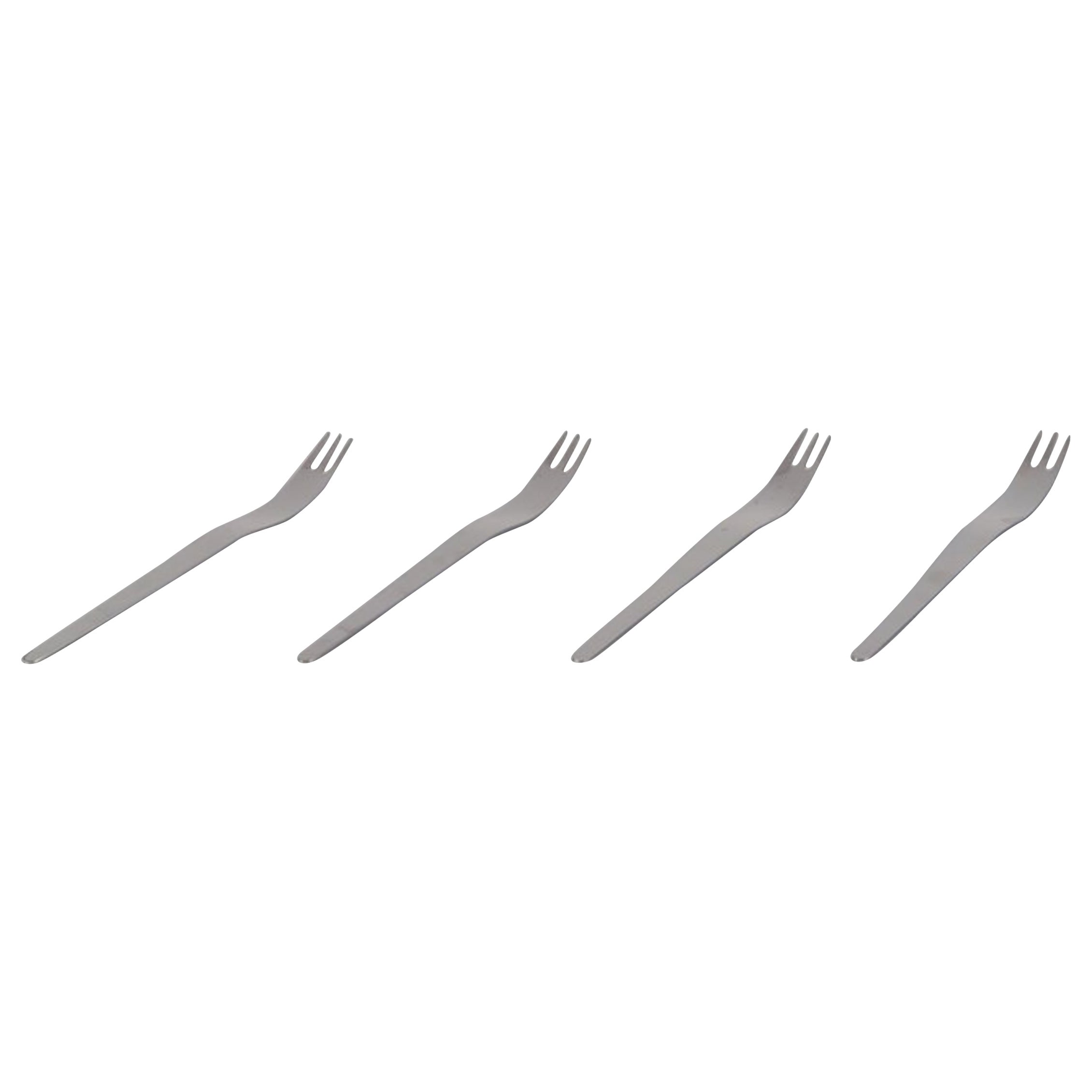 Arne Jacobsen for Georg Jensen. Four large salad forks in stainless steel.