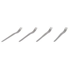 Arne Jacobsen for Georg Jensen. Four large salad forks in stainless steel.