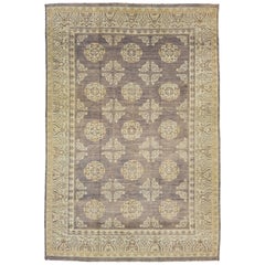 The Modernity Design/One Tapis en laine Khotan fait à la main dans les couleurs Brown et Blue Field 