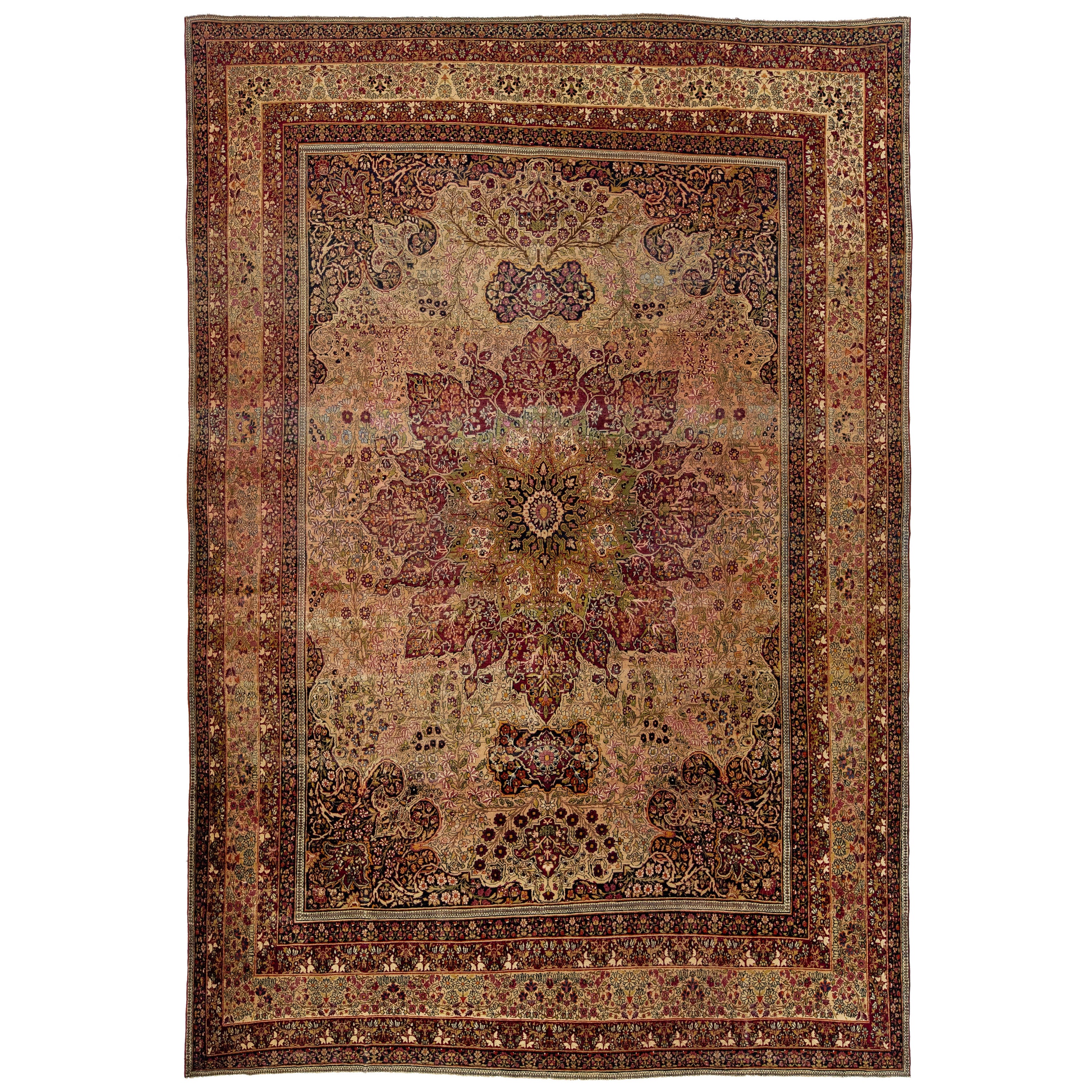 1880s Antique Persian Kerman Red Wool Rug Handmade Featuring a Rosette Motif 
