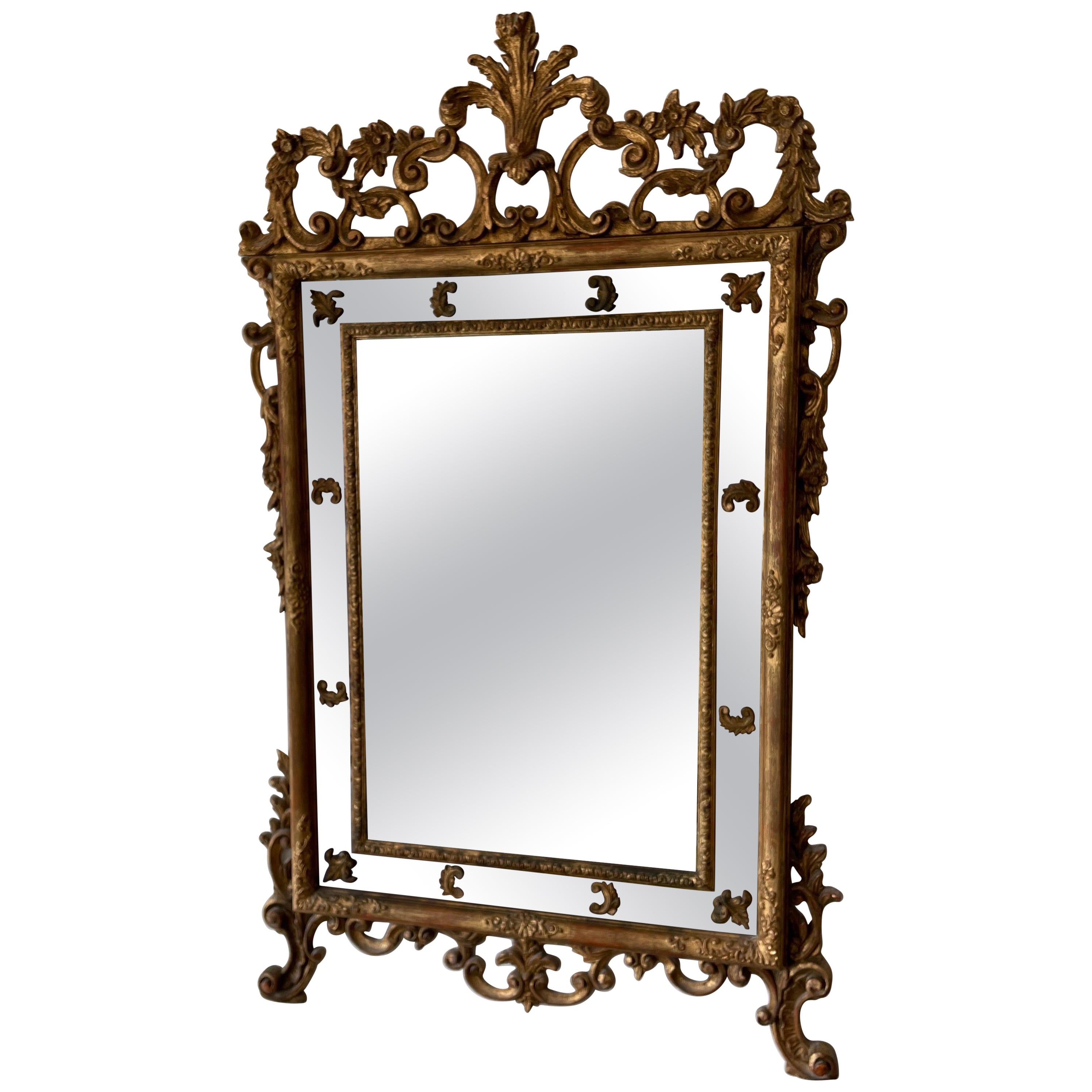 Grand miroir rocococo italien sculpté et doré en vente