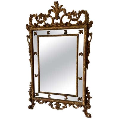 Italian Rococo Style Carved and Gilded Mirror For Sale at 1stDibs