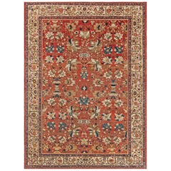 Ancien tapis persan Sultanabad à fond rouge floral fait à la main