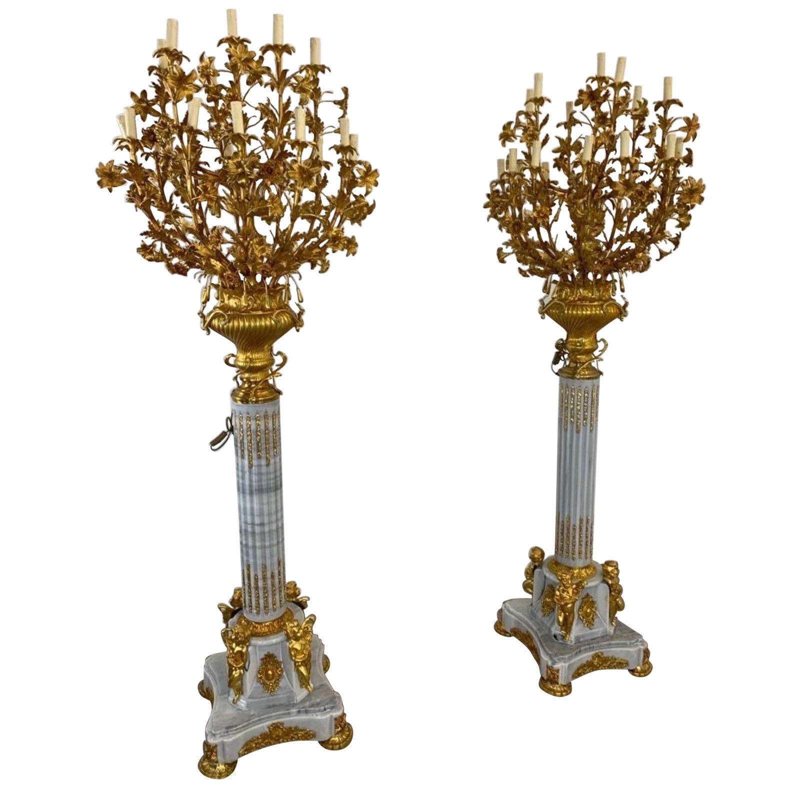 Pair of, 8ft French baroque standing lamps, with bronze decorated marble plinths For Sale
