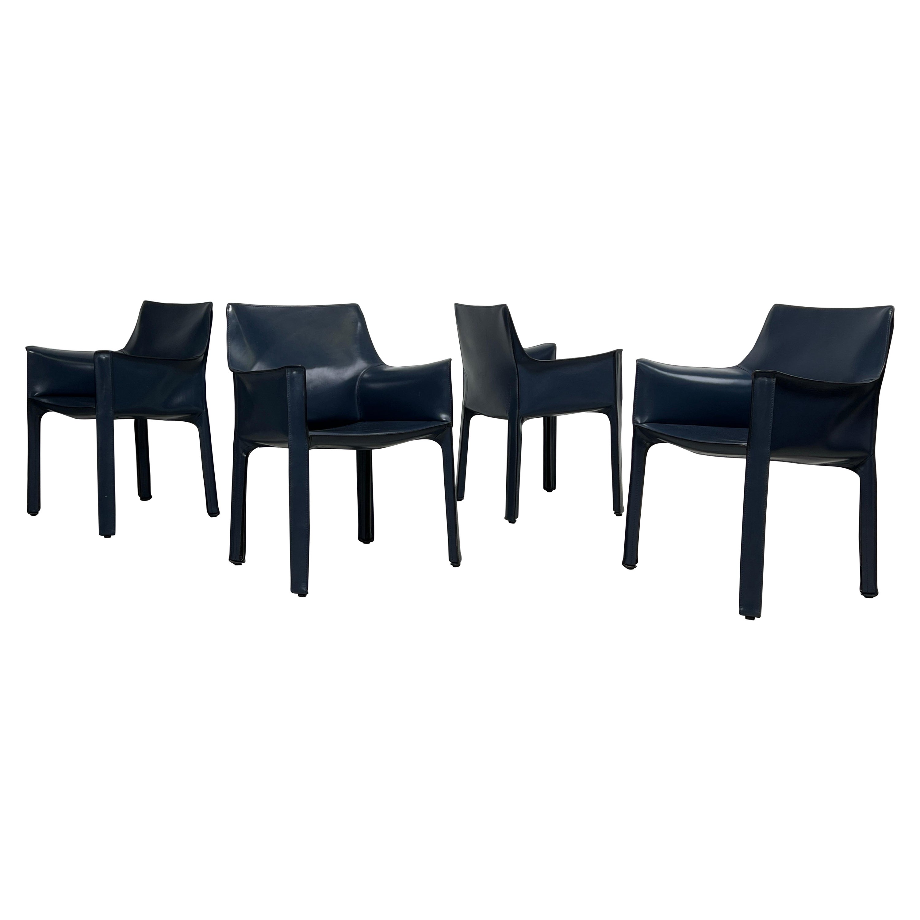 Four Blue Leather Cab Arm Chairs by Mario Bellini 