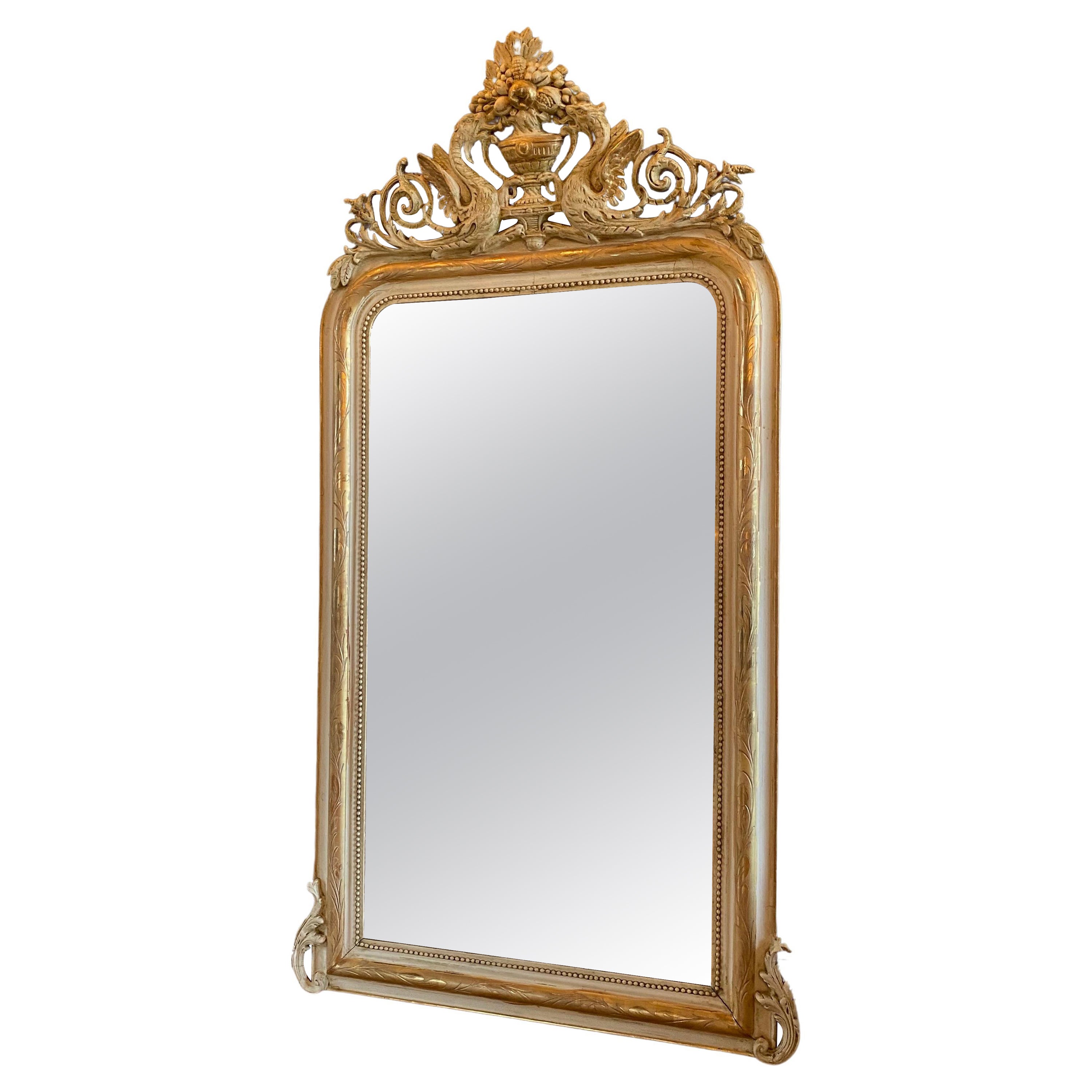 19th century French gilt wood mirror Louis Philippe with a crest For Sale