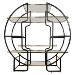 Étagère ou vitrine circulaire de style régence hollywoodienne en or et noir