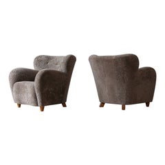 Vintage Pair of Lounge Chairs, Denmark, 1950s, Newly Upholstered in Sheepskin