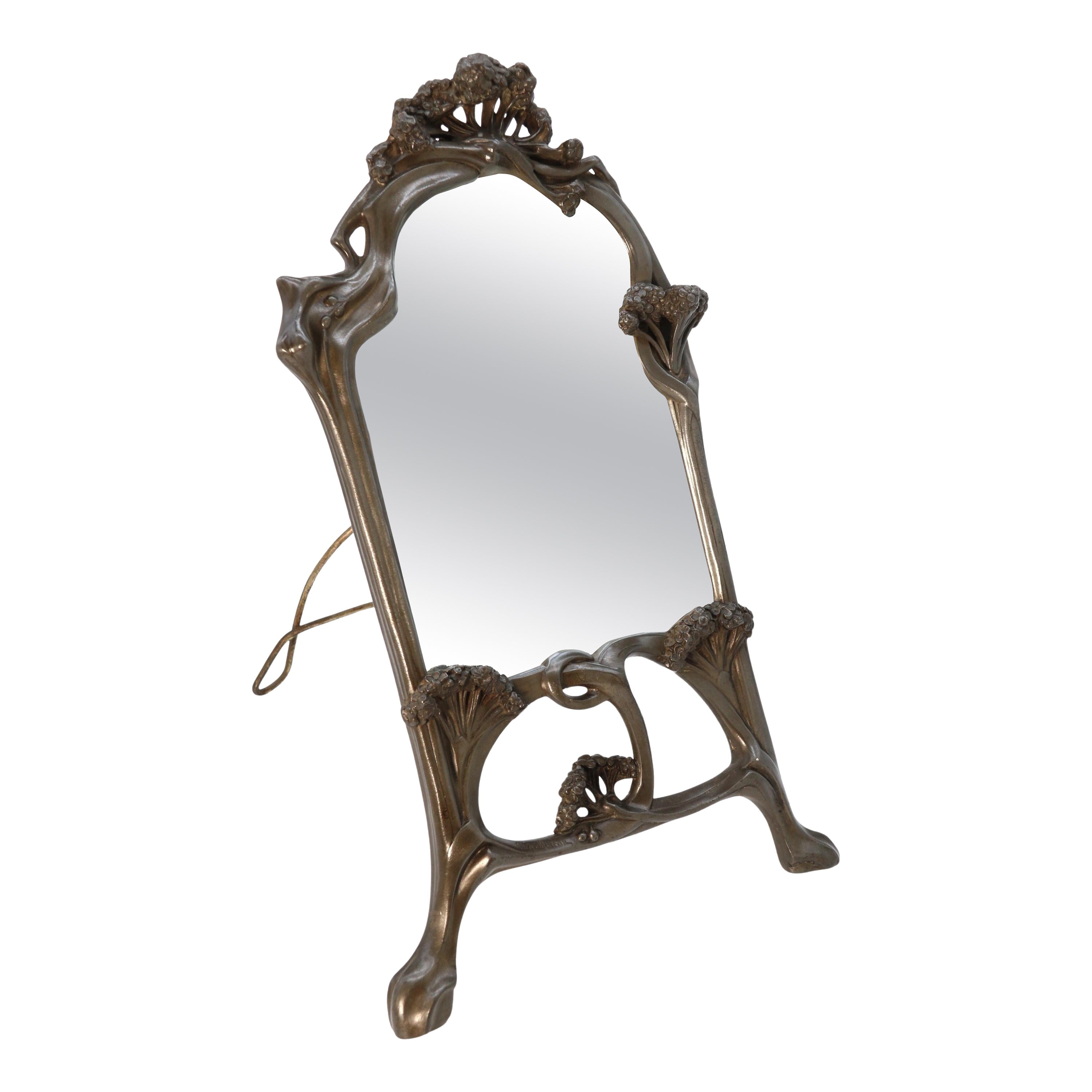 An Art Nouveau mirror by the French 19th century sculptor Louis Auguste Moreau. For Sale