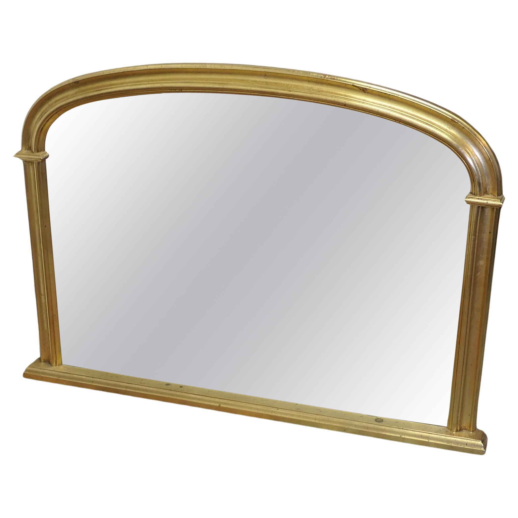 Miroir trumeau de style victorien arqué en or  Un joli miroir de cheminée    en vente