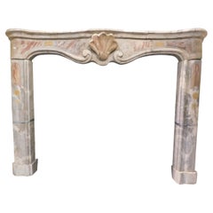 Fireplace mantle in Bardiglio marble with onyx inlays from Busca, Italy