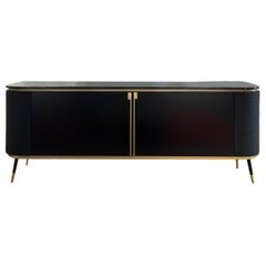 Chanel custom black lacquered marble top sideboard , doors covered in woven leather