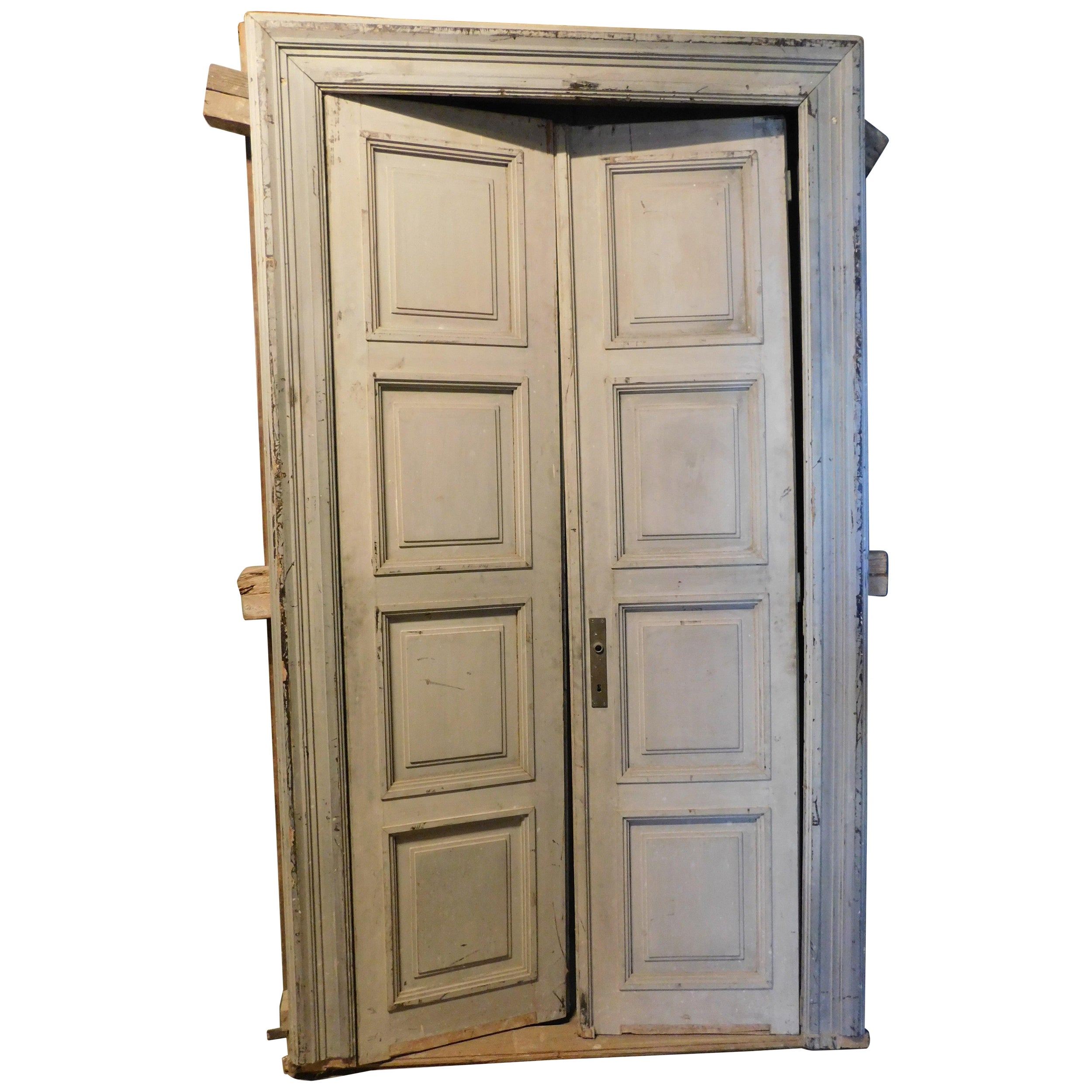 Lacquered double door and frame, with eight carved panels, grey, Italy For Sale