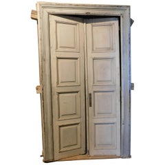 Antique Lacquered double door and frame, with eight carved panels, grey, Italy