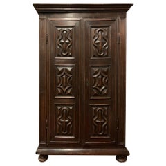 Used Wardrobe in poplar wood, two doors with six diamond-carved panels, Italy