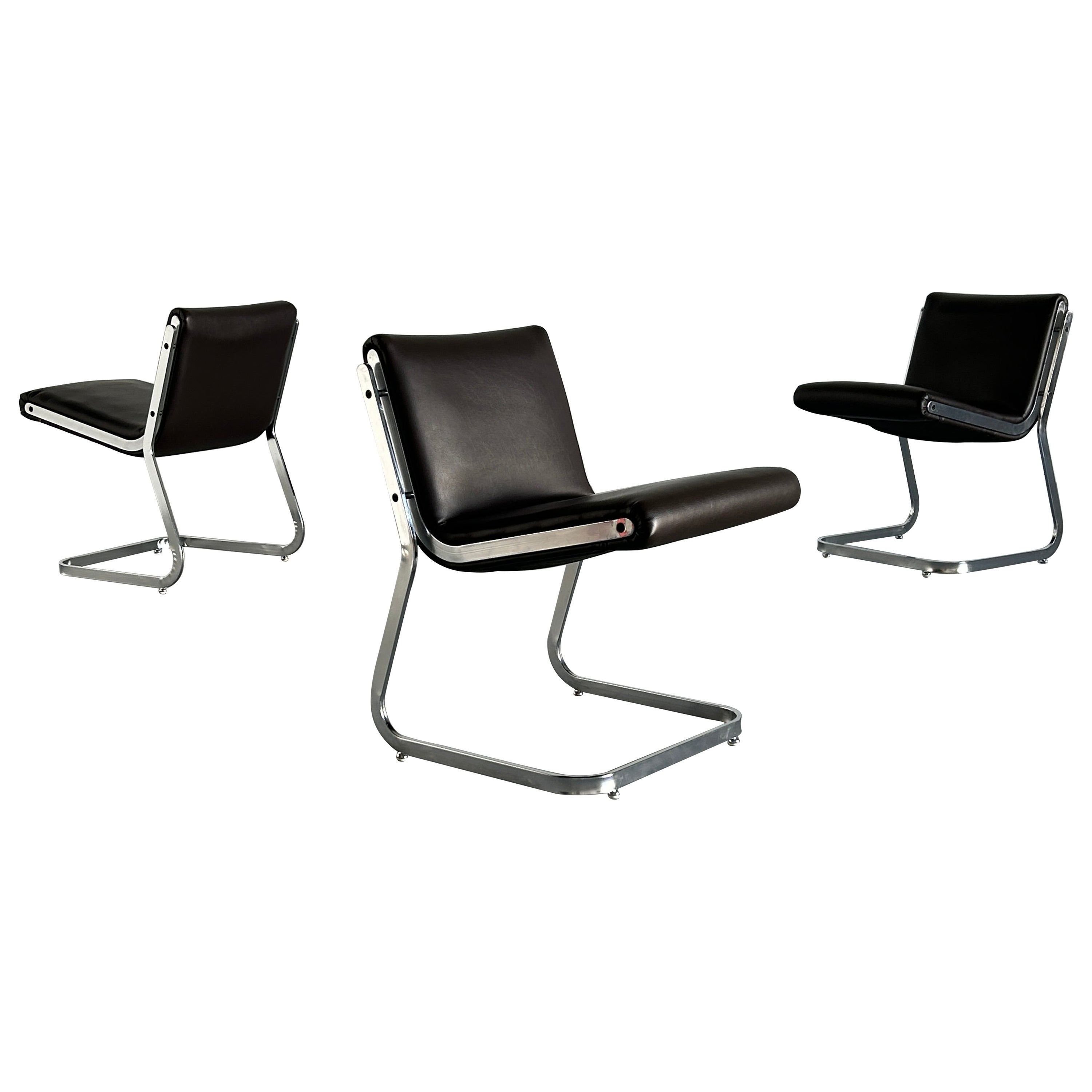 1 of 3 Italian Space Age Cantilever Lounge Chairs in Steel and Faux Leather, 70s For Sale