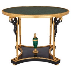Table de centre en malachite montée en bronze doré, de style Empire français 