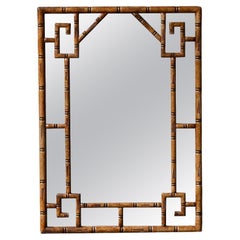 Antique Mirror with geometric patterns in carved bamboo-like wood from the 1920s