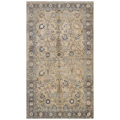 Traditioneller handgewebter blauer & elfenbeinfarbener geblümter persischer Täbris-Teppich