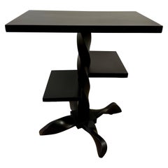 Mesa auxiliar de madera torcida negra