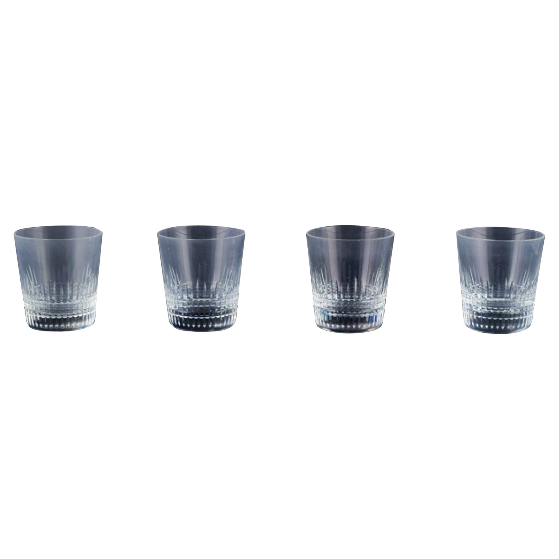 Baccarat, France. Set of four "Nancy" whiskey glasses in clear crystal glass.  For Sale