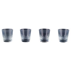 Vintage Baccarat, France. Set of four "Nancy" whiskey glasses in clear crystal glass. 