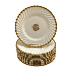 Juego de 12 platos de cena Mintons 'Gold Crocus', Inglaterra, hacia 1920