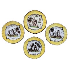 Ensemble de quatre assiettes Albisola jaunes